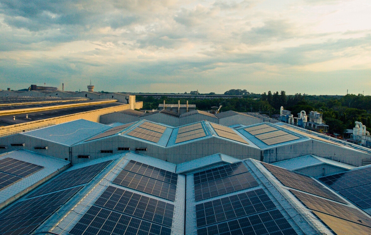 A cloudy sky over a commercial metal roofing installation in Massachusetts.