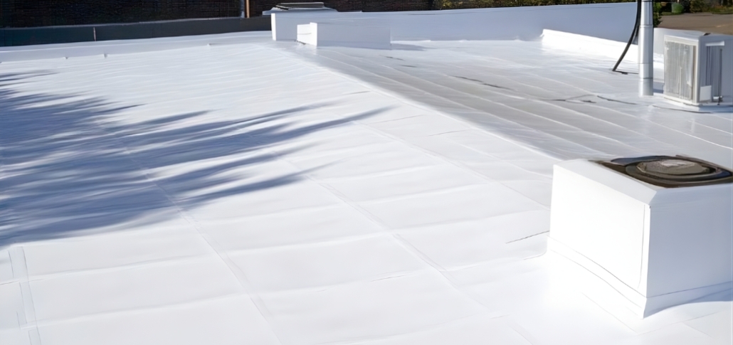 A white roof with a white covering, showcasing the EPDM roof installation and the importance of post-install maintenance.